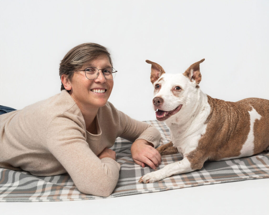 Emotional dog photography session capturing bond between dog and owner