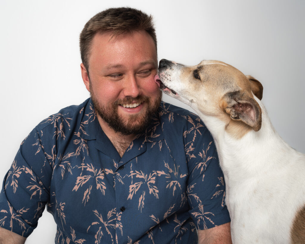 Family photos with dogs at a professional San Diego photography studio